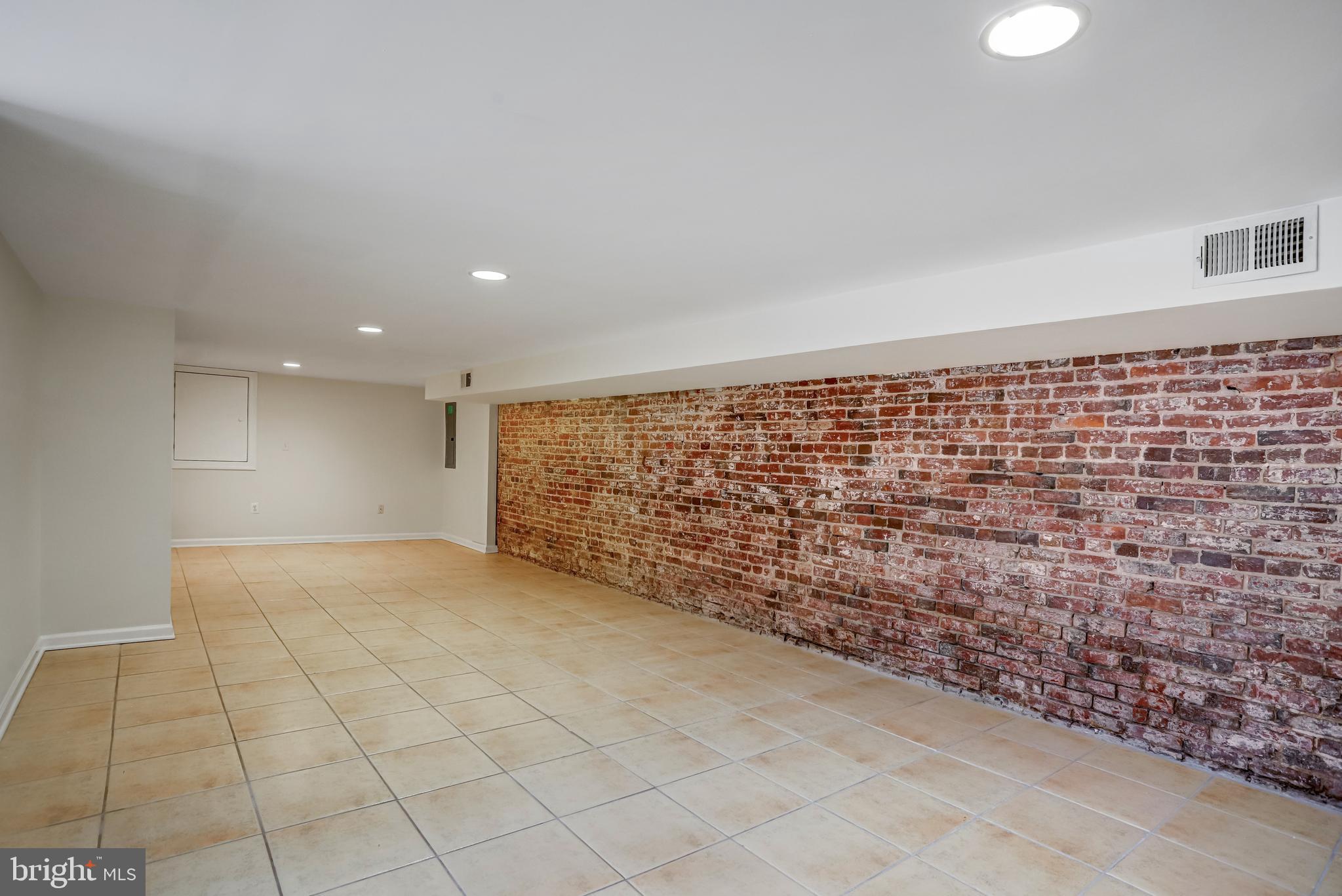 15 Todd Place Northeast Washington, DC 20002 - Photo 34 of 52 Brickwork, high ceilings, playroom or office