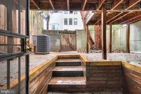 a front view of a building with street view