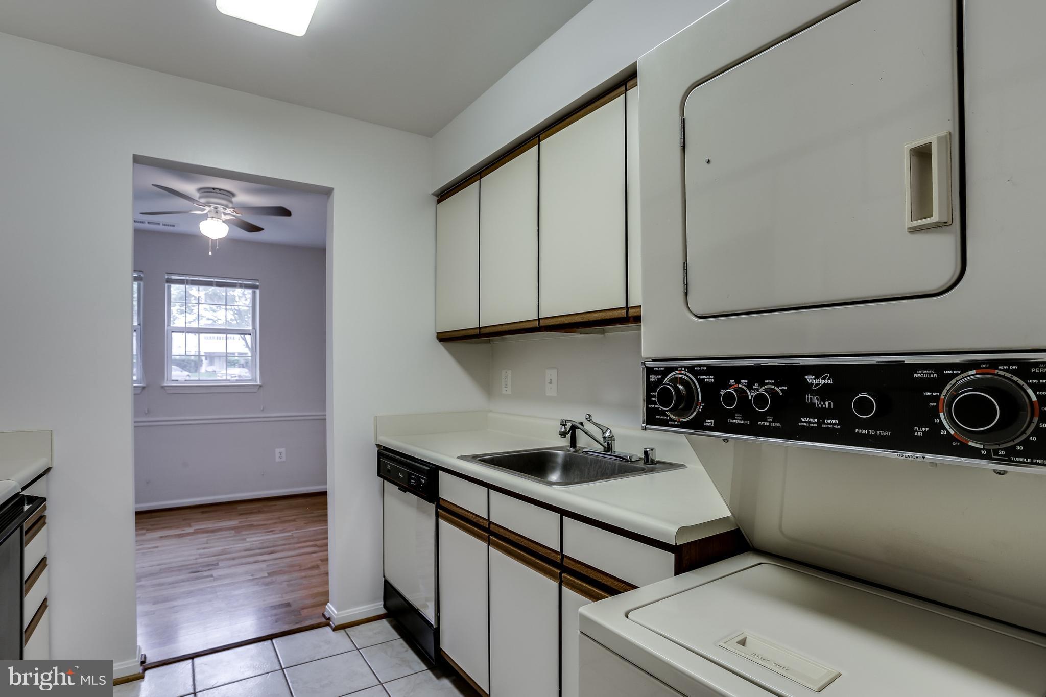 8589 Falls Run Road, Unit D Ellicott City, MD 21043 - Photo 8 of 24 Kitchen with Stackable Washer/Dryer!