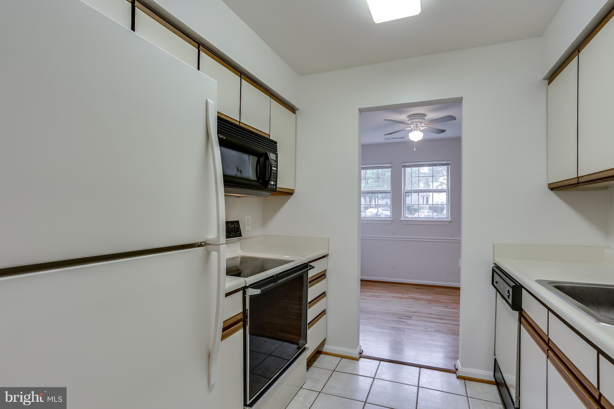 8589 Falls Run Road, Unit D Ellicott City, MD 21043 - Photo 9 of 24 Kitchen Leading into Dining Room!