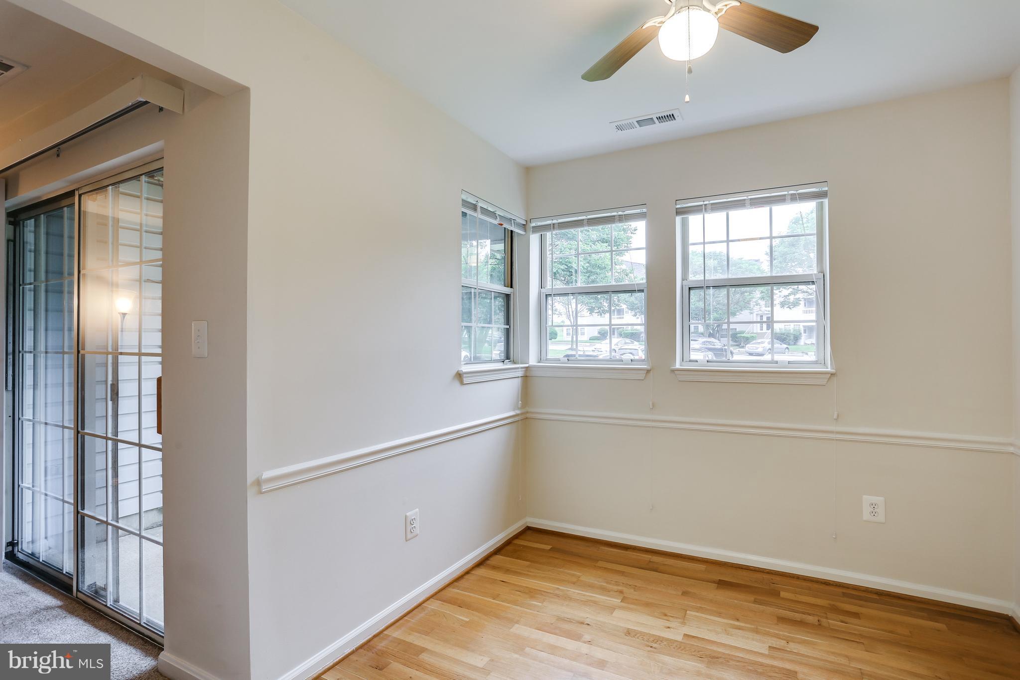 8589 Falls Run Road, Unit D Ellicott City, MD 21043 - Photo 10 of 24 Dining Room opens to Living Room.