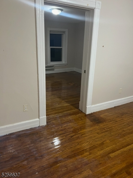 9 Moran Street, Unit 3 Newton, NJ 07860 - Photo 3 of 13 a view of wooden floor
