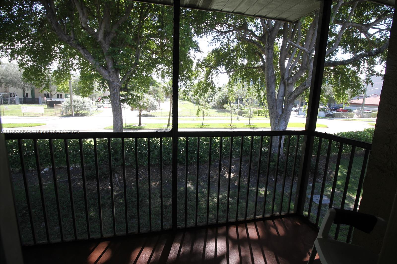 721 Northwest 103rd Terrace, Unit 202 Pembroke Pines, FL 33026 - Photo 15 of 24 a view of outdoor space with swimming pool