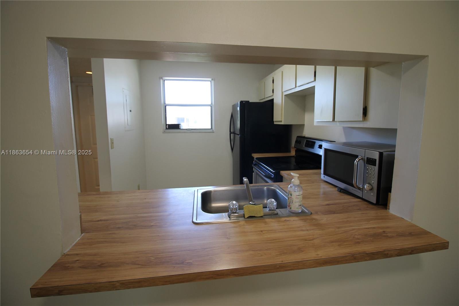 721 Northwest 103rd Terrace, Unit 202 Pembroke Pines, FL 33026 - Photo 5 of 24 a room with pool table and a fireplace