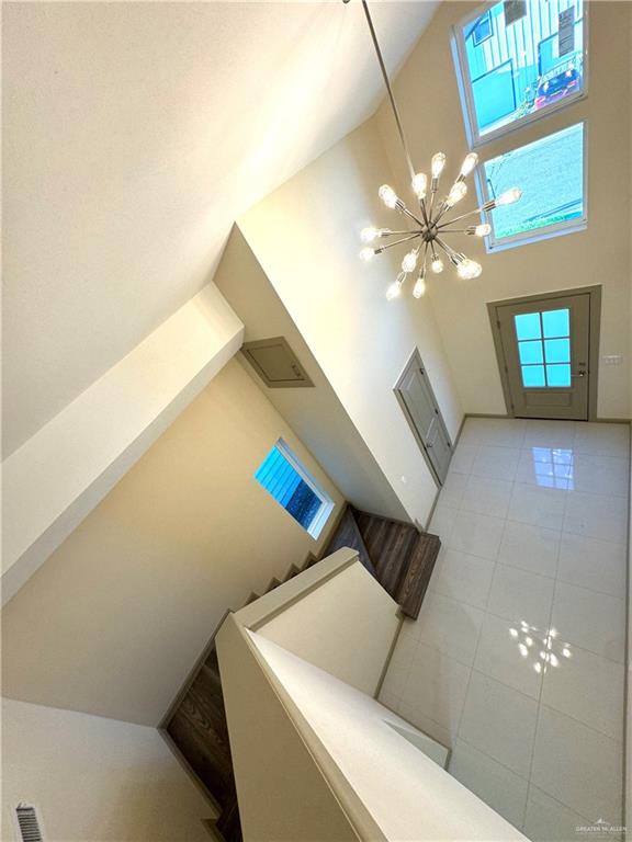 2810 Stablewood Mission, TX 78574 - Photo 9 of 18 a living room with furniture and a chandelier