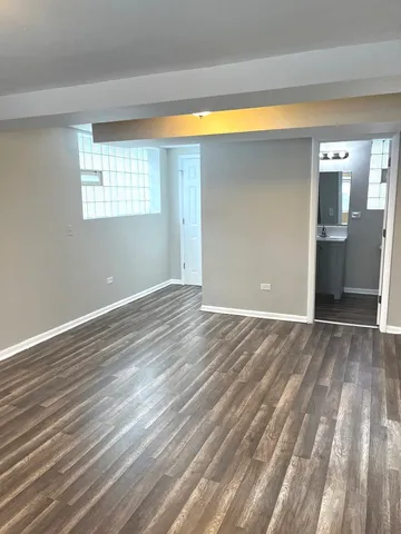 a bathroom with a sink a toilet and bathtub