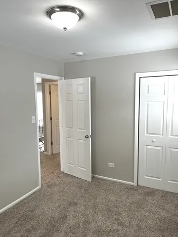 a bathroom with a toilet a sink and bathtub