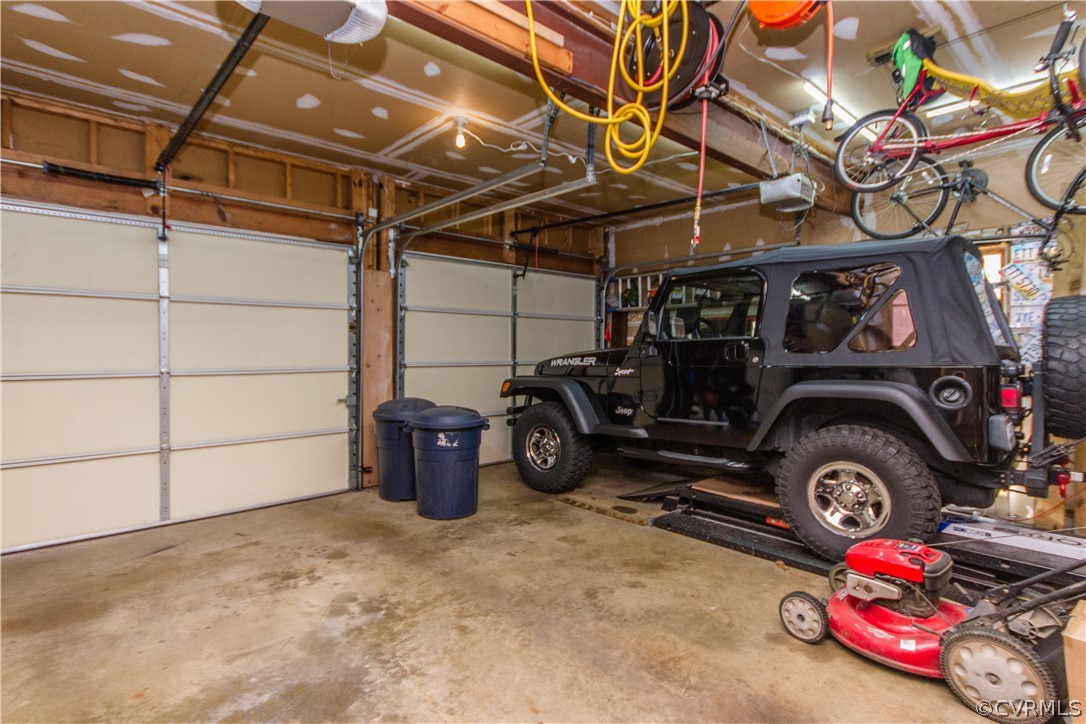 14010 Fiddlers Ridge Road Midlothian, VA 23112 - Photo 16 of 36 a view of a garage with storage