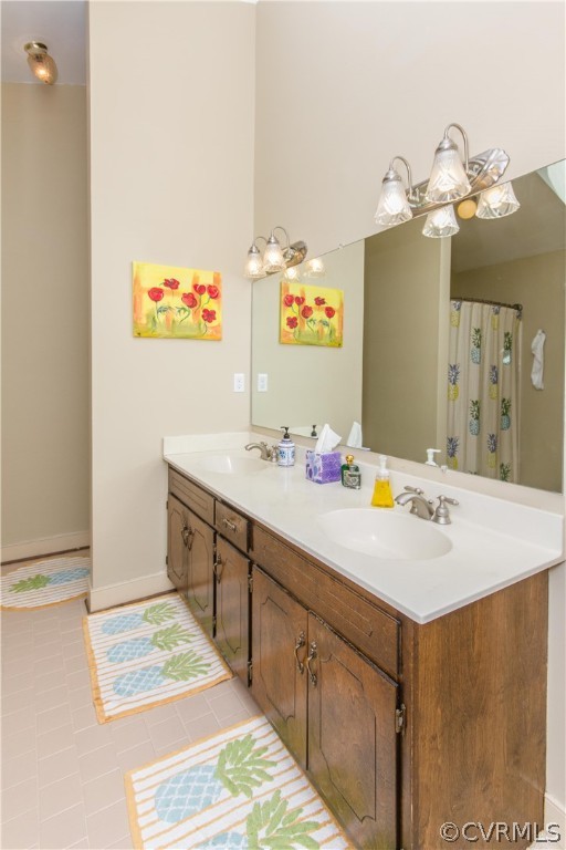 14010 Fiddlers Ridge Road Midlothian, VA 23112 - Photo 22 of 36 a bathroom with a sink vanity and a mirror
