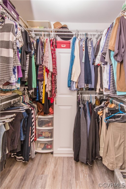 14010 Fiddlers Ridge Road Midlothian, VA 23112 - Photo 24 of 36 a view of walk in closet with clothes and shoes
