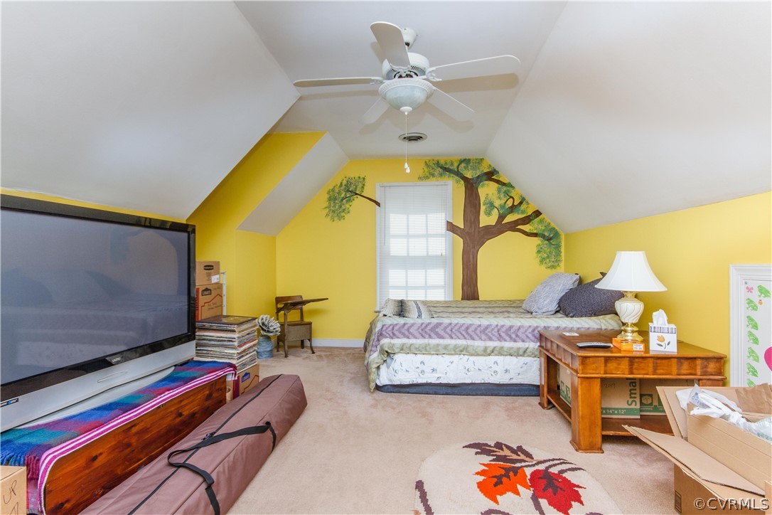 14010 Fiddlers Ridge Road Midlothian, VA 23112 - Photo 31 of 36 a bedroom with a bed a flat screen tv and paintings on the wall