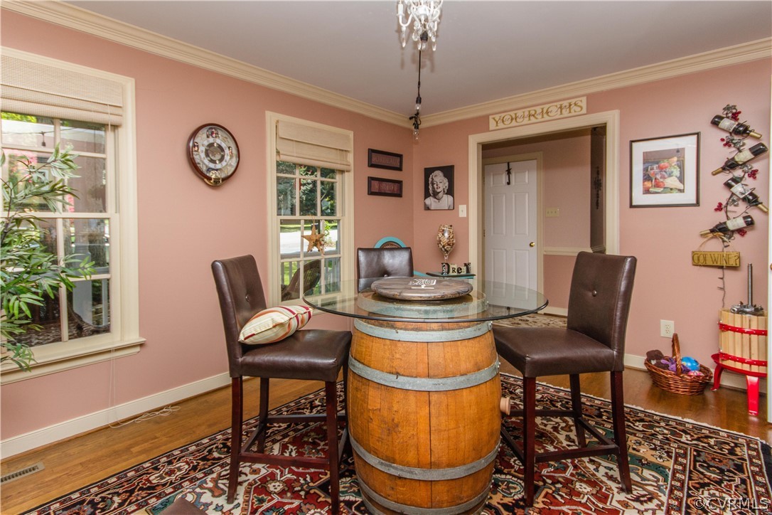 14010 Fiddlers Ridge Road Midlothian, VA 23112 - Photo 4 of 36 a view of a dining room with furniture window and wooden floor
