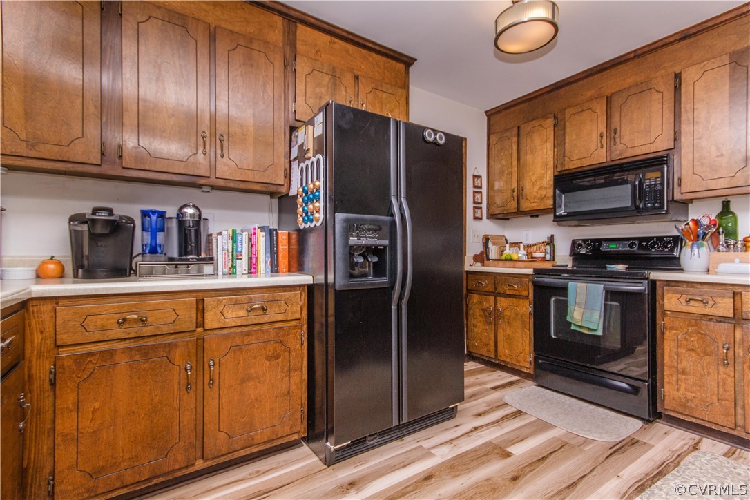 14010 Fiddlers Ridge Road Midlothian, VA 23112 - Photo 7 of 36 a kitchen with stainless steel appliances granite countertop a refrigerator stove and microwave
