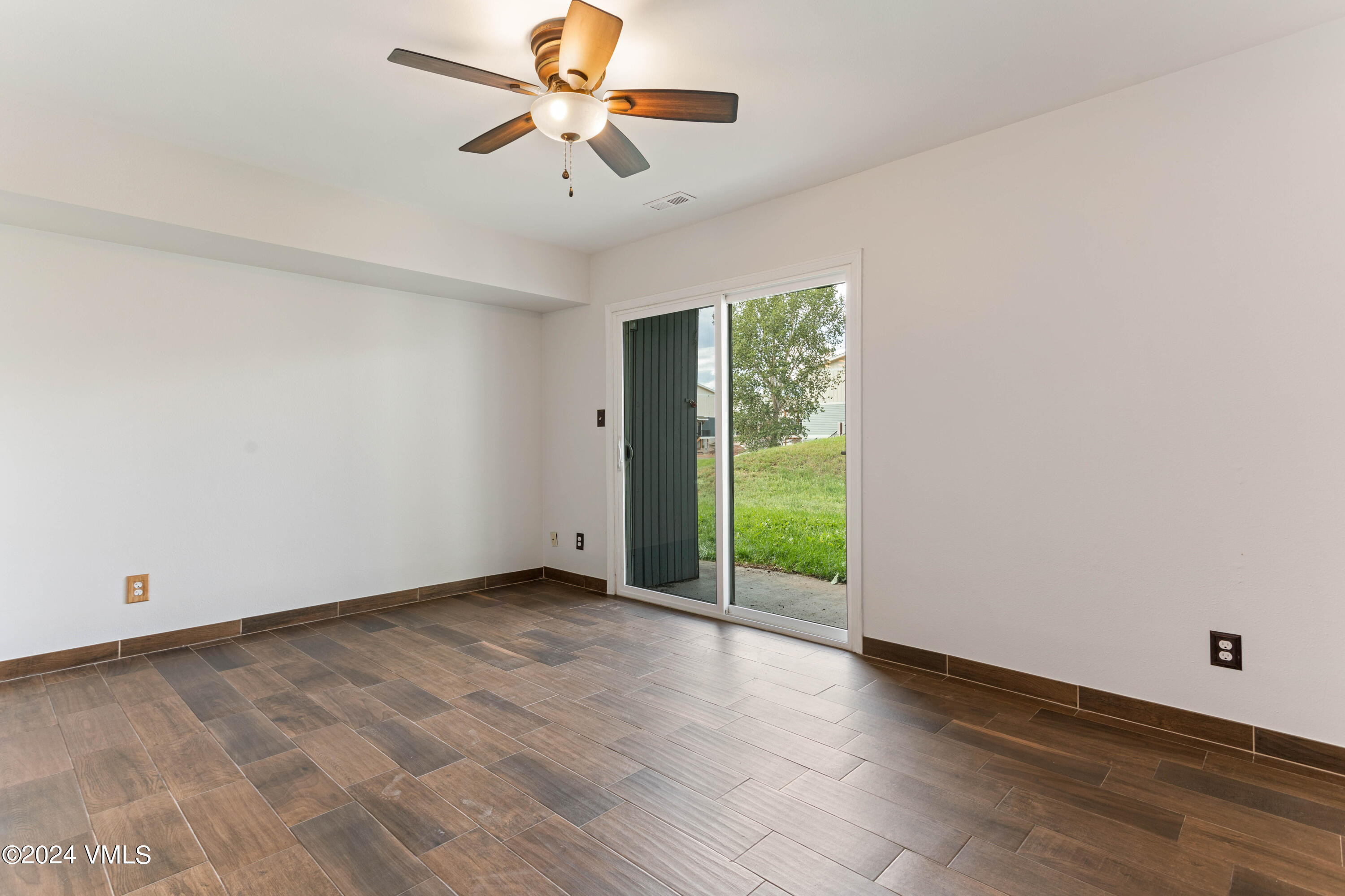528 East 3rd Street Eagle, CO 81631 - Photo 11 of 17 a view of an empty room with a window