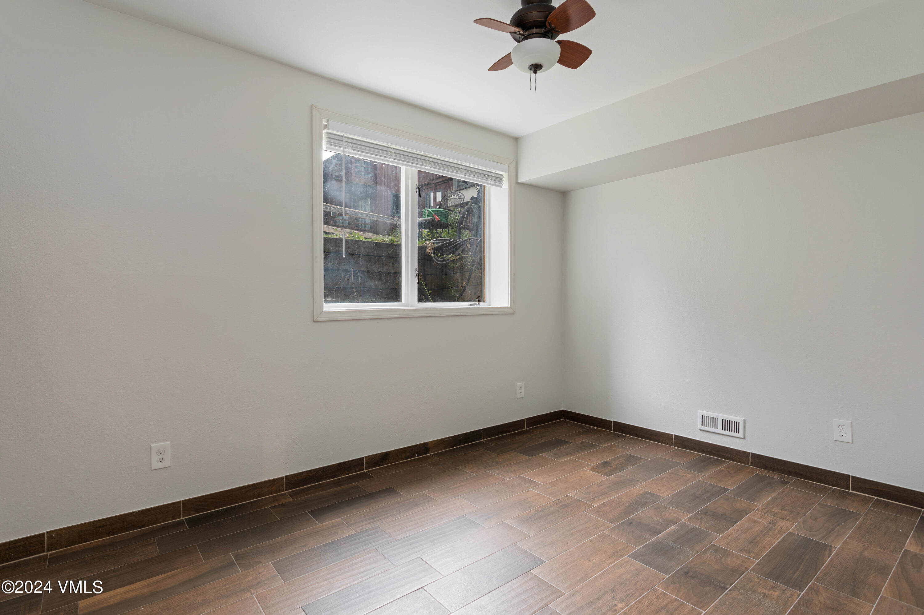 528 East 3rd Street Eagle, CO 81631 - Photo 14 of 17 a view of an empty room with a window