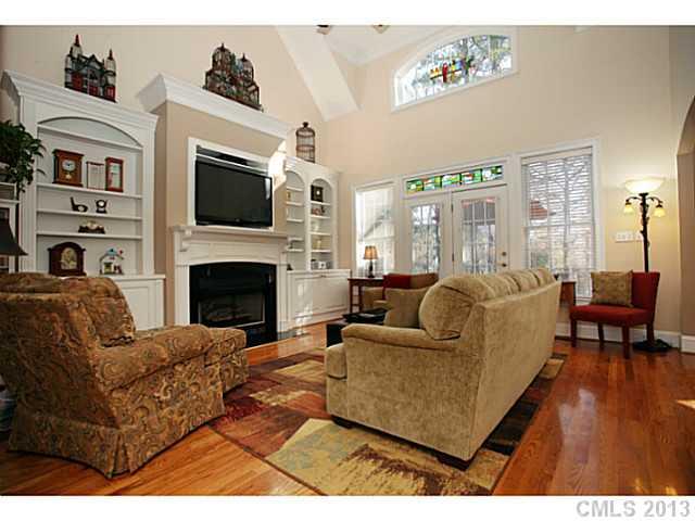 501 St Ives Court Fort Mill, SC 29708 - Photo 2 of 16 a living room with furniture fireplace and a flat screen tv