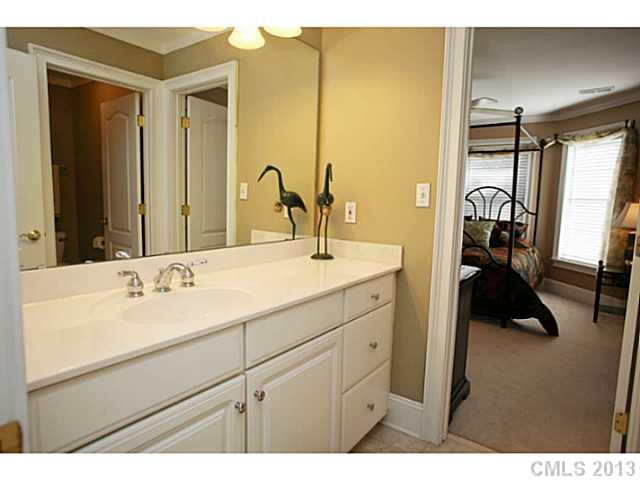 501 St Ives Court Fort Mill, SC 29708 - Photo 13 of 16 a en suite bathroom with a sink and a mirror