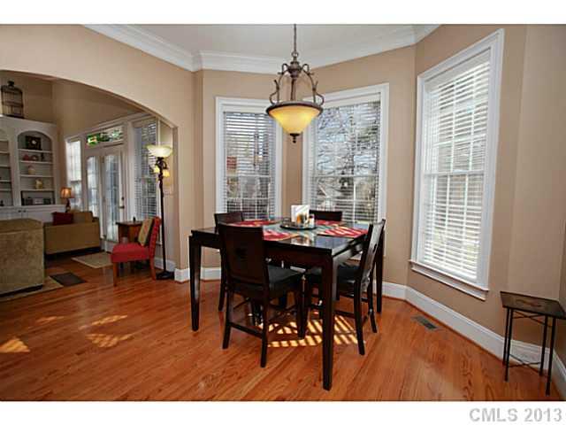 501 St Ives Court Fort Mill, SC 29708 - Photo 6 of 16 a view of a dining room with furniture window and wooden floor