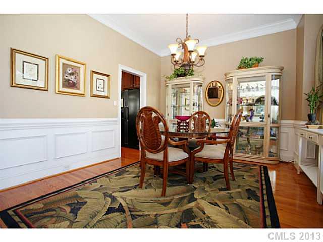 501 St Ives Court Fort Mill, SC 29708 - Photo 7 of 16 a view of a dining room with furniture and chandelier