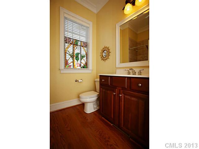 501 St Ives Court Fort Mill, SC 29708 - Photo 8 of 16 a bathroom with a toilet sink and mirror