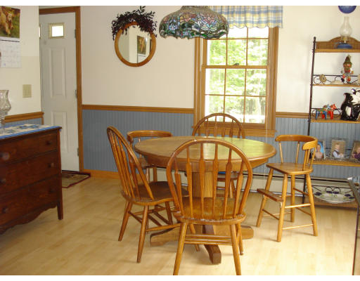128 Haynes Road Townsend, MA 01469 - Photo 3 of 12 a dining room with furniture and a window