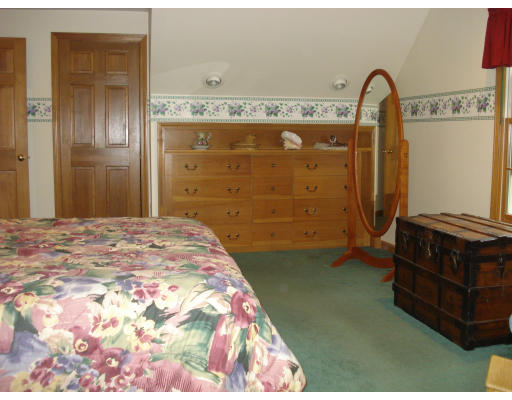 128 Haynes Road Townsend, MA 01469 - Photo 6 of 12 a bedroom with a bed and a dresser