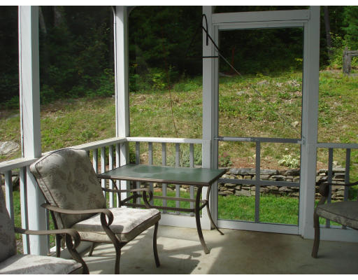 128 Haynes Road Townsend, MA 01469 - Photo 9 of 12 a view of a chairs and table in patio