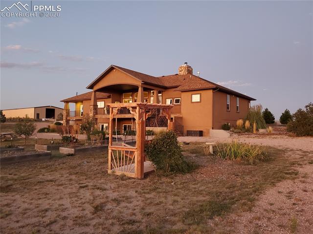 5930 North Log Road Peyton, CO 80831 - Photo 34 of 40 -Playhouse for kids
• -800 sf fenced duck/chicken coup