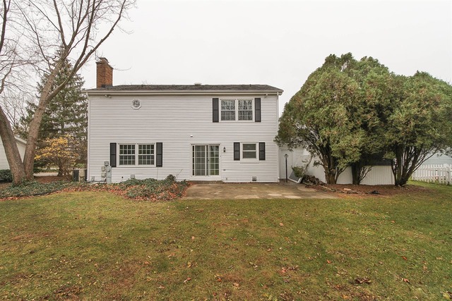 981 West Bauer Road Naperville, IL 60563 - Photo 21 of 21 a view of a yard in front of a house with a tree