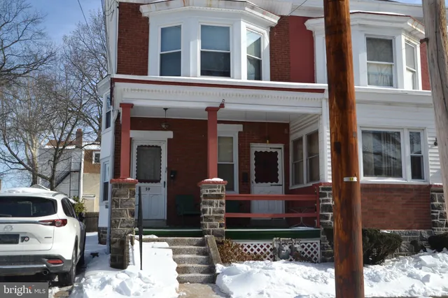 a view of a car park in front of a building