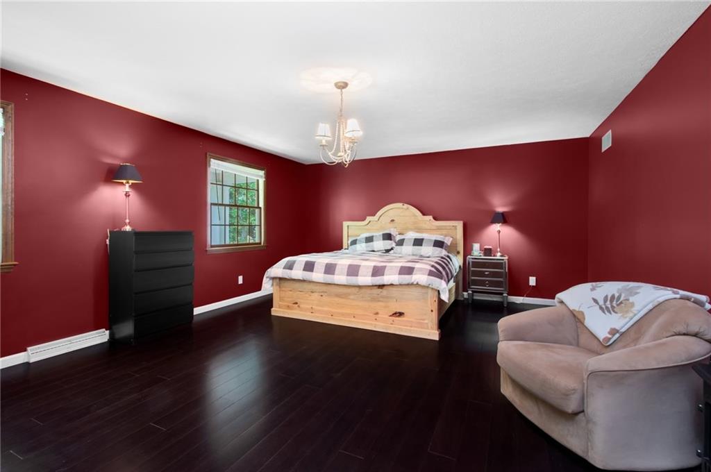 276 Oakville Road Beaver Falls, PA 15010 - Photo 12 of 25 A king size accommodating master bedroom features gorgeous bamboo floors.