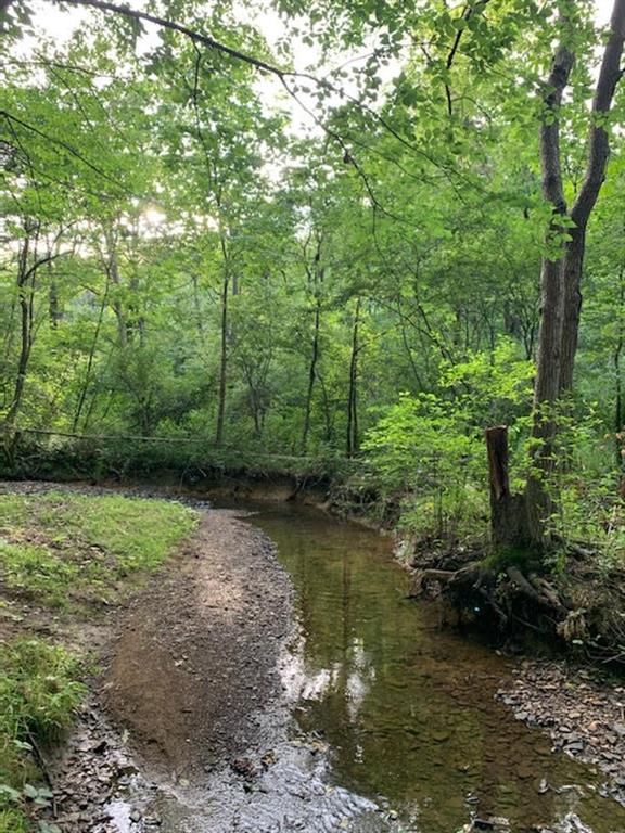 276 Oakville Road Beaver Falls, PA 15010 - Photo 25 of 25 Stroll down the walking trail sheltered by the numerous trees to a meandering brook at the edge of the property!