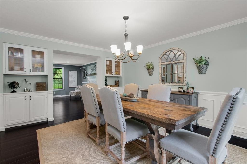 276 Oakville Road Beaver Falls, PA 15010 - Photo 5 of 25 The formal dining room is banquet sized and features bamboo floors, 2 built-in display cabinets, judges paneling & crown molding.