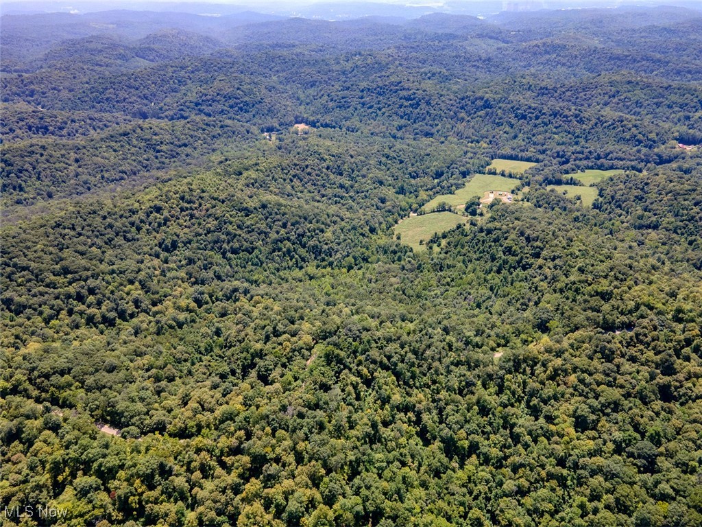 19 Zion Ridge Road Marietta, OH 45750 - Photo 9 of 19 Drone / aerial view of a mountainous background and a forest
