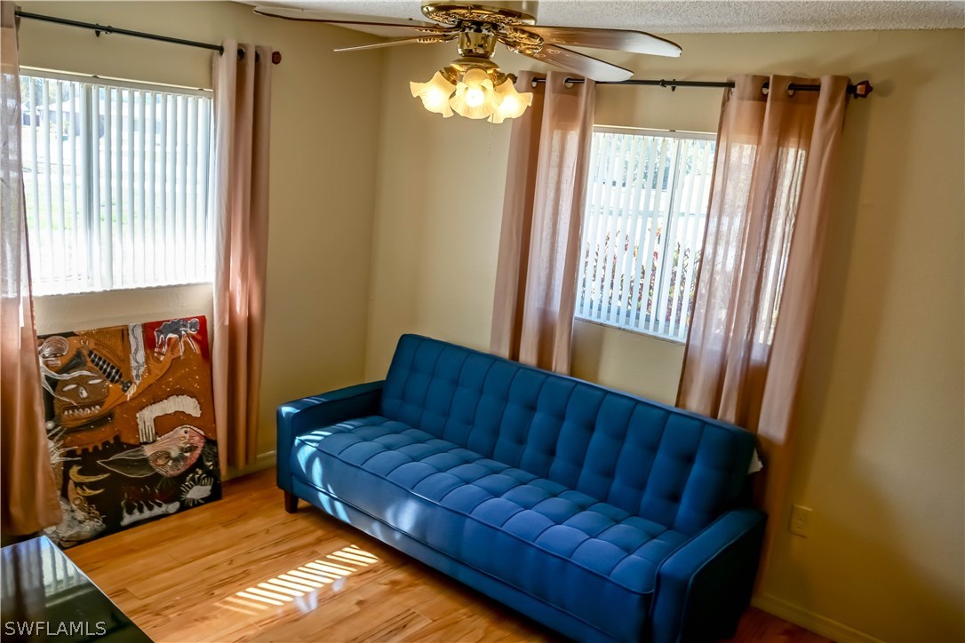 18473 Geranium Road Fort Myers, FL 33967 - Photo 11 of 25 a living room with furniture and a window