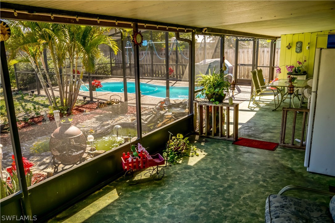 18473 Geranium Road Fort Myers, FL 33967 - Photo 17 of 25 a view of swimming pool from a balcony