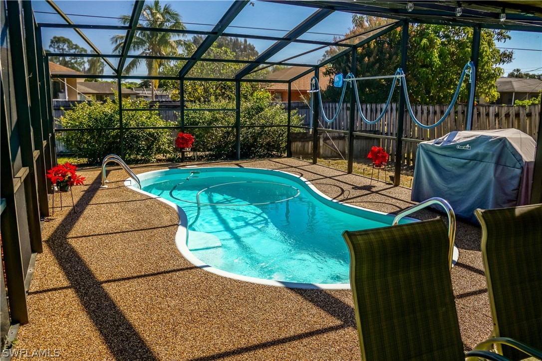 18473 Geranium Road Fort Myers, FL 33967 - Photo 20 of 25 a view of a chairs and table in patio
