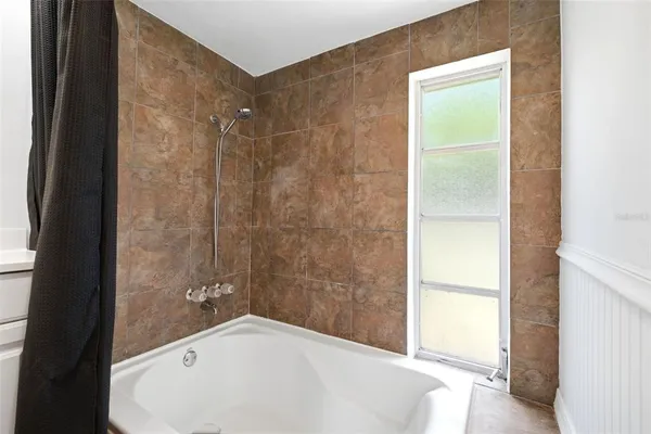 a bathroom with a bathtub