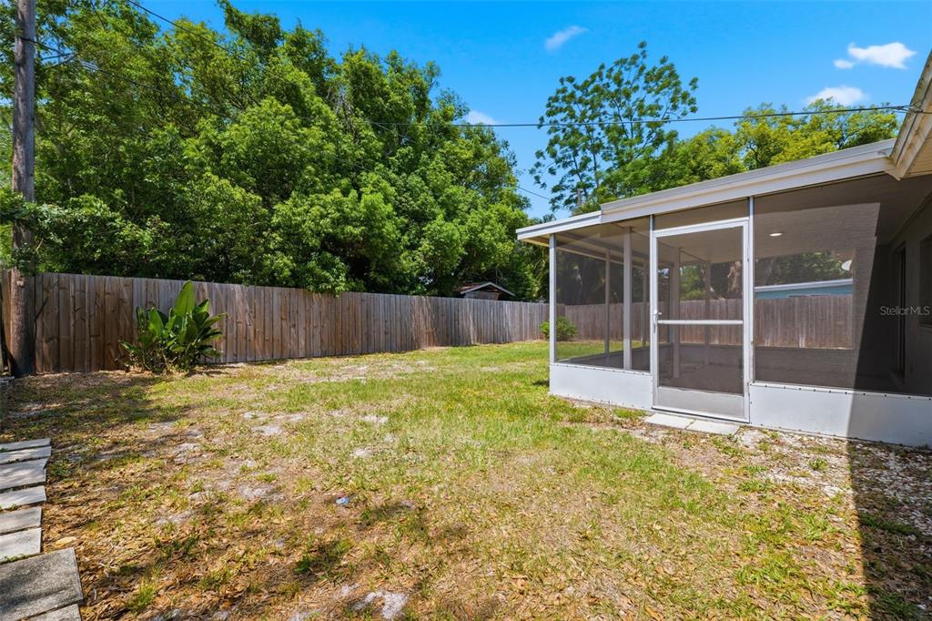 3303 Williamsburg Loop Holiday, FL 34691 - Photo 27 of 31 a view of backyard with green space