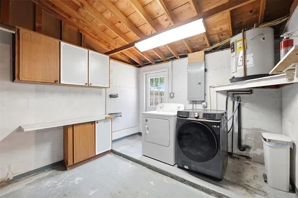 a view of a room with storage and utility room