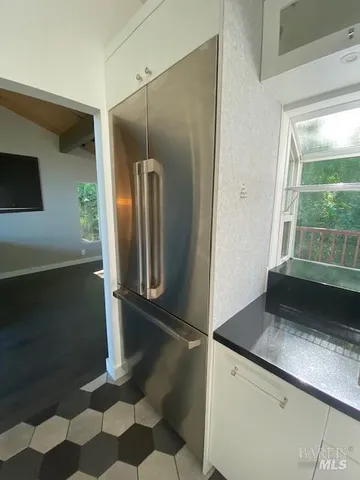 a bathroom with a sink double vanity and a mirror