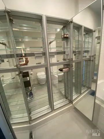 a view of lot of space and wooden floor