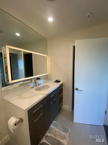 a room with walk in closet and stairs