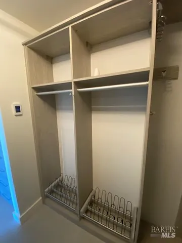 a view of balcony with wooden floor and lake view