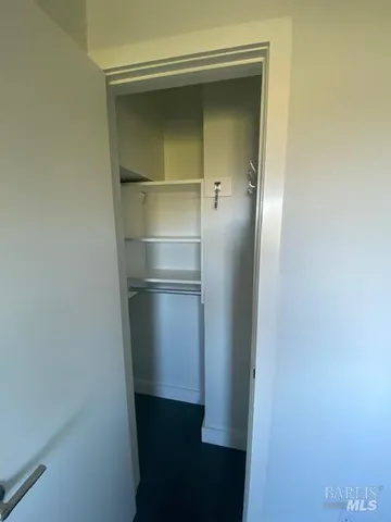 a kitchen with stainless steel appliances granite countertop a sink and a refrigerator