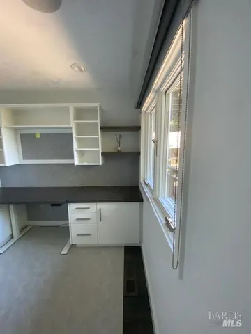 a view of a balcony with an outdoor space