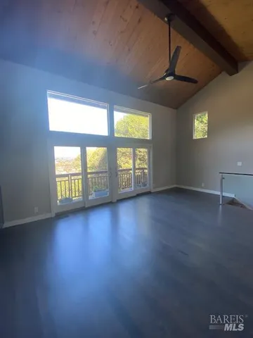 a view of livingroom with furniture and window