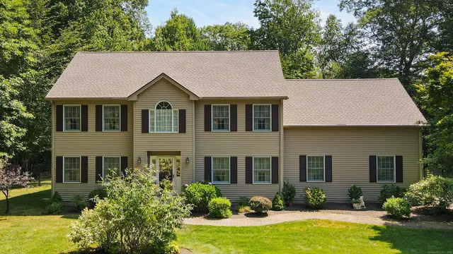 a house that has a lot of plants in it