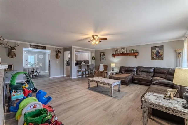 a bedroom with furniture and a gym equipment