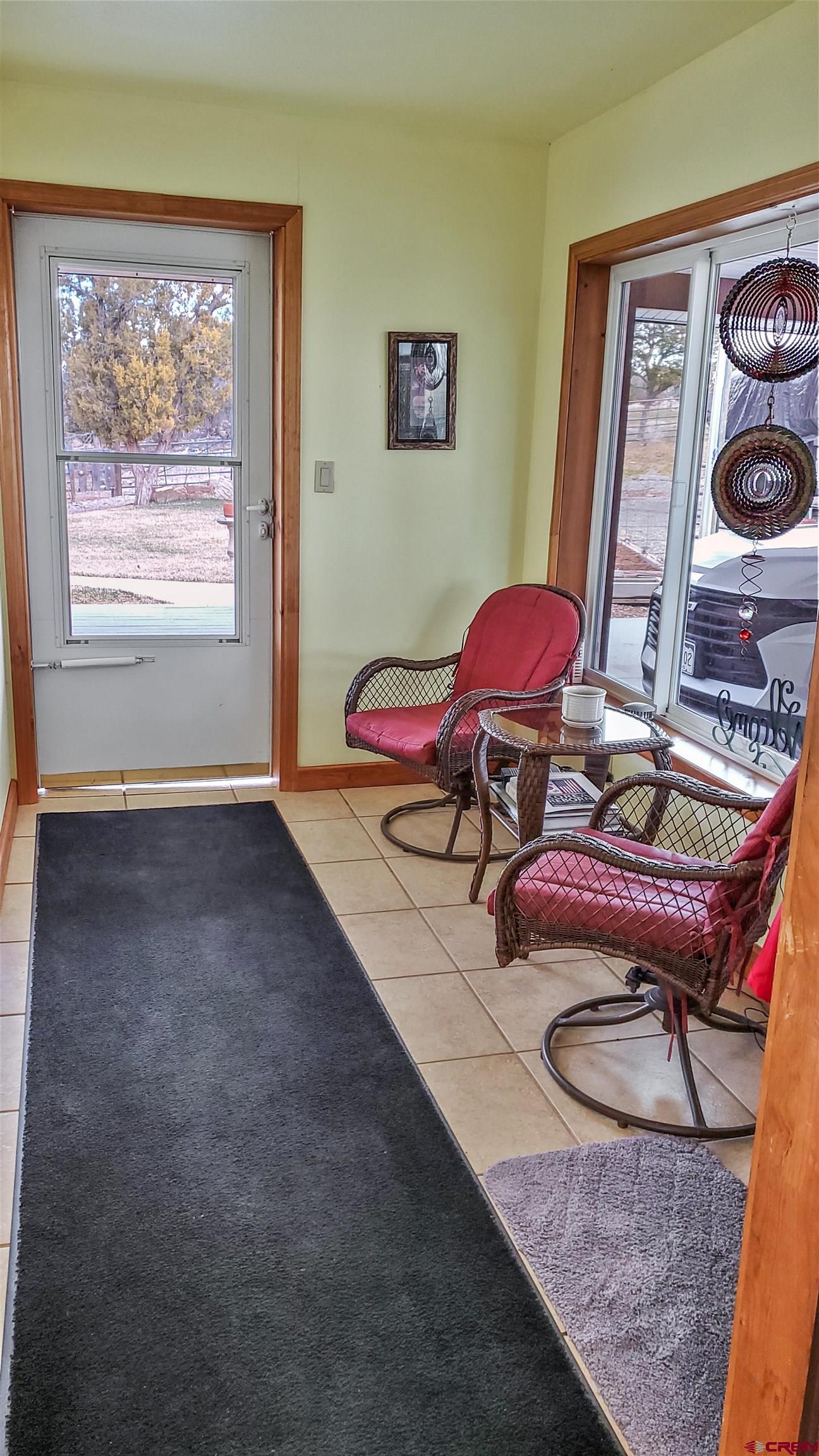 34354 3575th Road Redvale, CO 81431 - Photo 17 of 30 a room with furniture and screen on the wall
